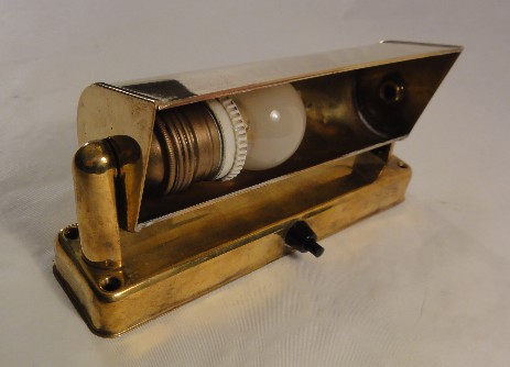 modernist wall applique turning reflector